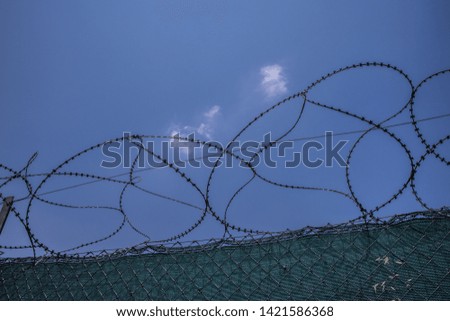 Barbed wire, separating two areas. It is forbidden to enter, old Nicosia.