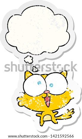 crazy cartoon cat with thought bubble as a distressed worn sticker