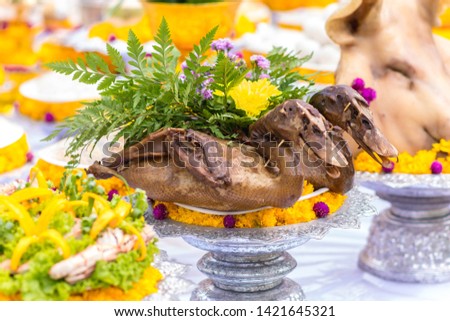 Divine offerings in Hinduism include flowers, incense, candles, food and fruits.