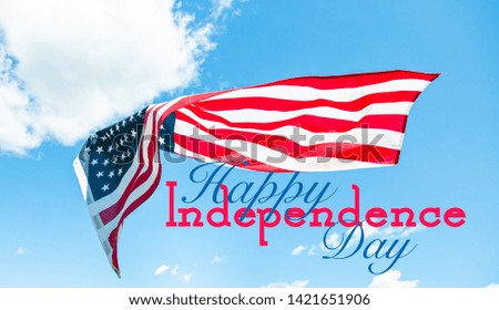 United States flag. Happy Independence day 4th of July. American flag in blue sky background. 
