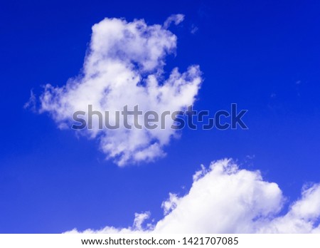 Bright pop blue sky with white clouds. Great background
