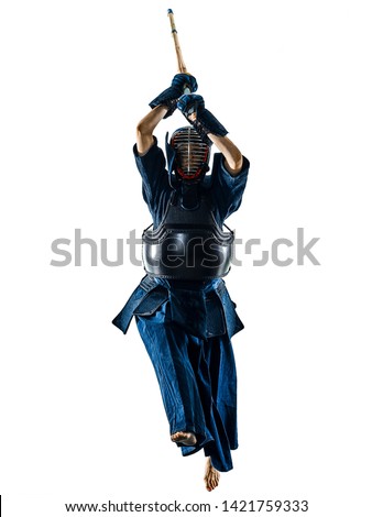 one woman  Kendo martial arts fighters combat fighting in silhouette isolated on white bacground Royalty-Free Stock Photo #1421759333