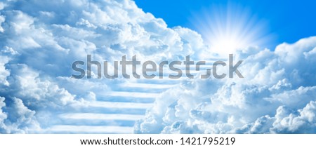 Stairway Curving Through Clouds Into The Light Of Heaven With Blue Sky Royalty-Free Stock Photo #1421795219
