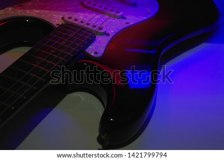 Parts of Electric guitar. Close up view of electric guitar body with string, volume and tone controls. Music concept. Music equipment. Musical instruments