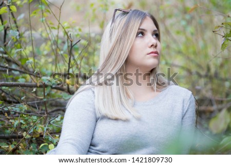 Portrait of a young attractive long blonde haired woman - Image