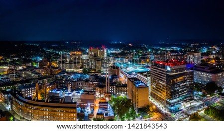 Aerial panorama of New Haven, Connecticut by night. New Haven is the second-largest city in Connecticut after Bridgeport Royalty-Free Stock Photo #1421843543