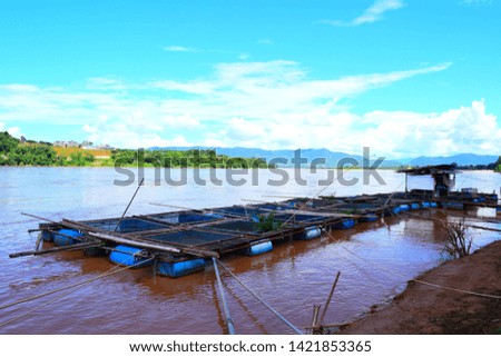this pic show fish cage culture in Mekong river Thailand