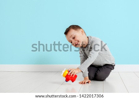 boy playing with a air at home