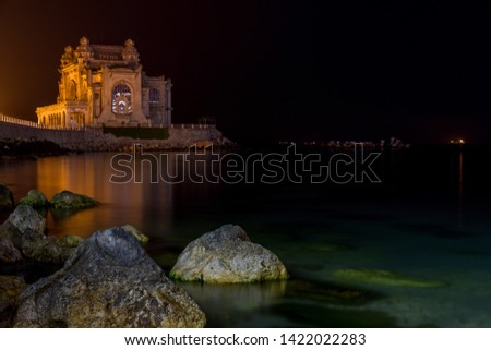 night photo old casino on the black sea shore in constanta city, romania