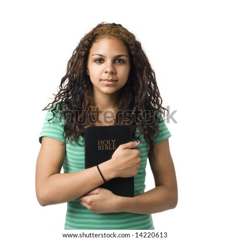 Girl holds bible