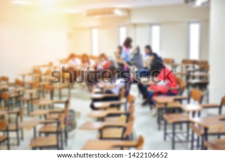 Students on the back of classroom in blurred background style or selective focused image, education or academic concept picture of lecture hall without participants in the front, the college learners 