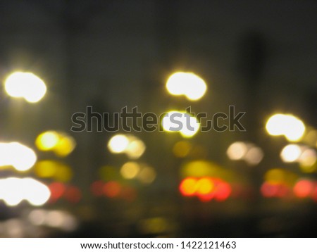 Blurred street lamp light in the city.