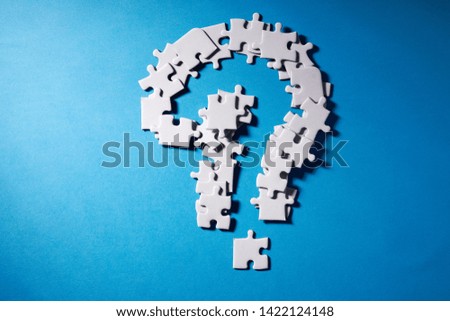 White details of puzzle on blue background