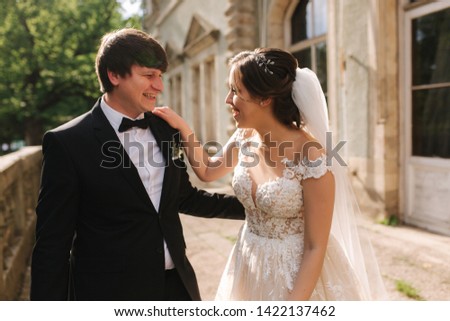 Portrait of happy groom and bride. Beautiful wedding couple