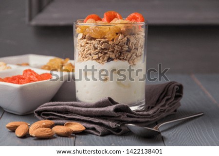 Homemade yogurt with granola, dried fruit and nuts bio with most healthy seed.