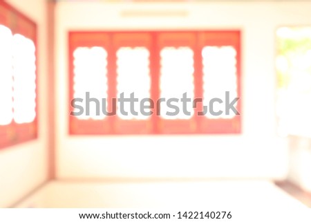 Blurred background with copy space in religion concept. This is a blur picture of the window of the temple.