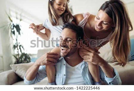 Happy family having fun time at home Royalty-Free Stock Photo #1422225446