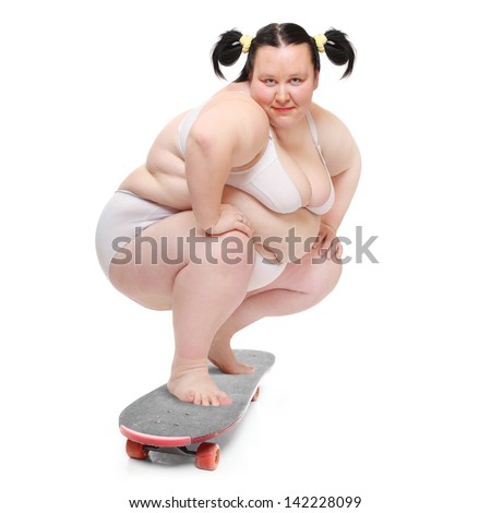 Funny overweight woman skateboarding.