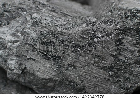 The surface of natural black hard coal for texture background. Best grade of metallurgical anthracite coals often referred to as stone coal and black diamond coal Royalty-Free Stock Photo #1422349778