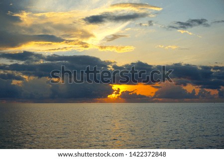 Cloudy sky sunset Indian ocean                              