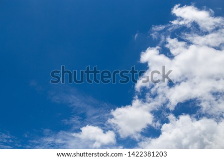 at noon of one day in rainy season the sky look so clear by sunlight,bright blue sky full of white cloud moving by the wind