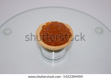 Tasty Beautiful Red Caviar  in the bowl. Photo food concept.