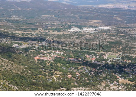 View of the village of La Cabrera and road a-1 with drone, Madrid.