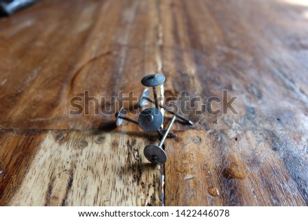 Nails are used for wood construction work.