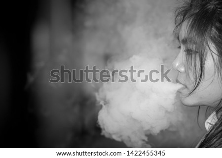 Black and white images of young women who are secretly smoking at school. Smoking women, Asian women smoking