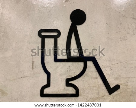 public restroom or toilet with man sign on marble vintage wall 