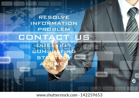 Businessman touching CONTACT US sign on visual screen
