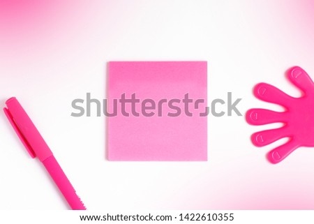 space for text on a pink sticker, template for writing, pink pen next to the sheet of paper for writing, in pink color