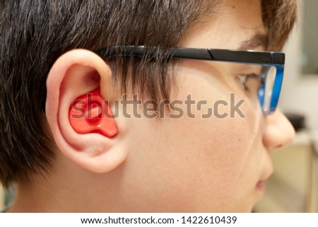 Ear plug mold making for child Royalty-Free Stock Photo #1422610439