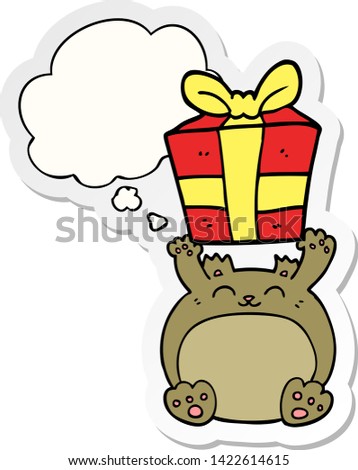 cute cartoon christmas bear with thought bubble as a printed sticker
