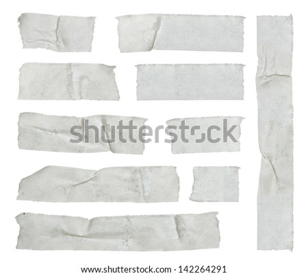 Strips of masking tape isolated on white Royalty-Free Stock Photo #142264291