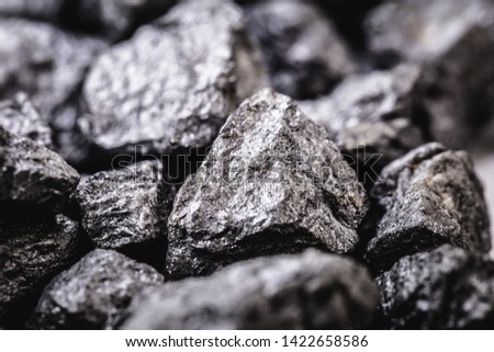 several bare silver nuggets, texture of silvery stones. Royalty-Free Stock Photo #1422658586