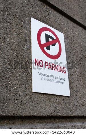 No Parking - Violators will be towed at owner's Expense