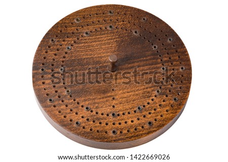 Cribbage board. Antique unusual circular version. Card game. wooden and brass crib dominoes board to keep score. Vintage Round Cribbage board circa Victorian Edwardian. Clipping path included in jpeg.