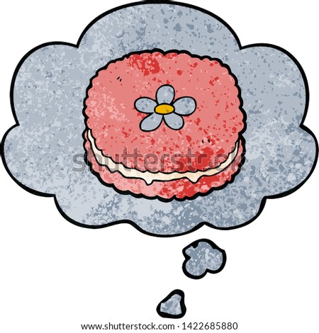 cartoon biscuit with thought bubble in grunge texture style