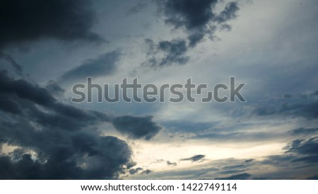 Time lapse of dark stormy clouds after rain on sunset, rolling and building clouds, bad weather go out