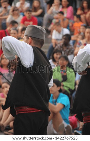 Traditional Balcainc dance in a festivl