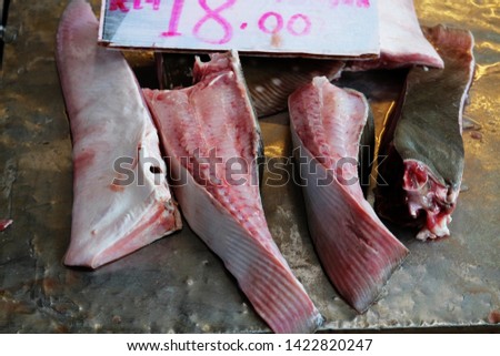 A picture of stingray fish flesh on the table for sale at Sarawak.