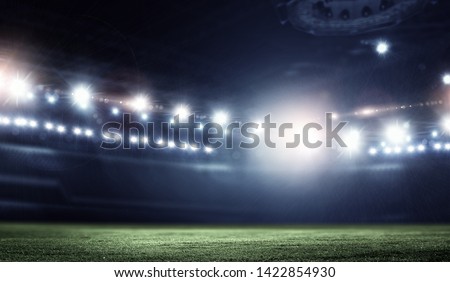 Night football arena in lights close up