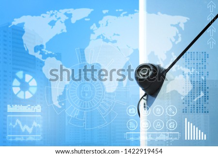 Modern security CCTV camera and virtual icons on color background