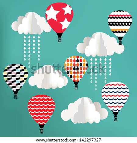 Clouds with hot air balloon on blue background