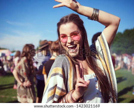 Dancing woman at the music festival 