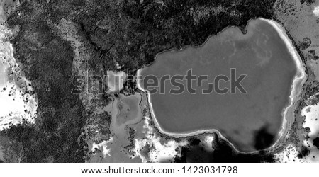 glioblastoma multiforme, black gold, polluted desert sand, black and white photo, abstract photography of the deserts of Africa from the air, aerial view, abstract naturalism, contemporary photo art,