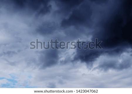The sky in the clouds after the summer thunderstorm. The amazing dramatic texture of the clouds, the background image. 	