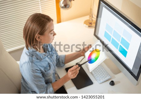graphic designer sitting at work. Illustrator. web designer. freelancer