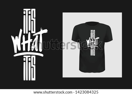 What it is phrase t shirt print design. Creative saying for black apparel mock up. White grunge brush stroke texture inscription. Minimalistic trendy typography on short sleeve shirt
